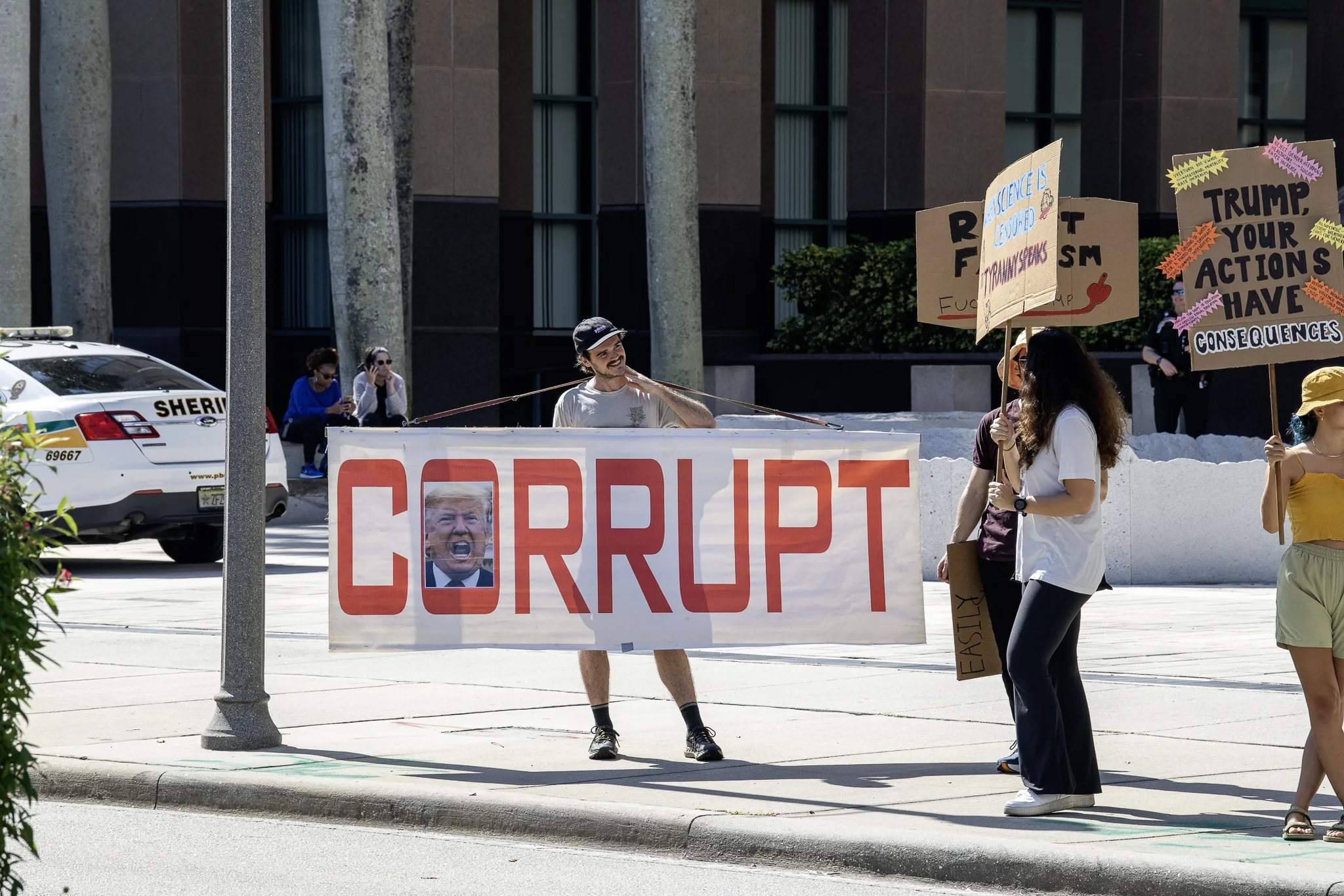 Protester holding a large 